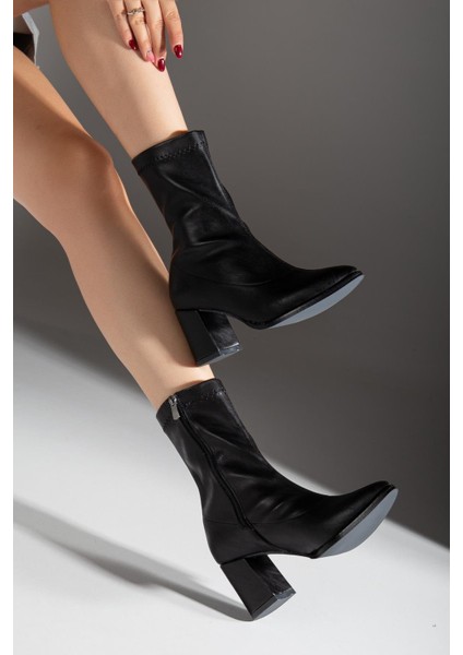 Kadın Kahverengi Sivri Burun Fermuarlı Dikiş Detaylı Esnek Kalın Topuklu Bilekte Streç Bot Bootie modelleri