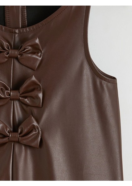 Yeni Sezon Fiyonk Detaylı Deri Görünümlü Kız Çocuk Elbise ve Külotlu Çorap modelleri