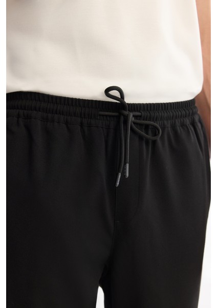 Erkek Siyah Beli Lastikli Bağcıklı Duble Paça Jogger Relaxed Fit Pantolon E003000 fırsatları