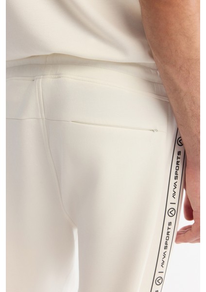 Erkek Ekru Beli Lastikli Bağcıklı Elastan Regular Fit Eşofman Altı A42Y3418 indirimleri