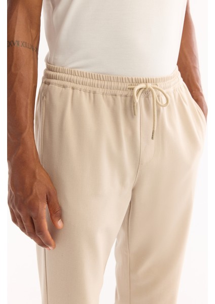 Erkek Bej Beli Lastikli Bağcıklı Duble Paça Jogger Relaxed Fit Pantolon E003000 fırsatları