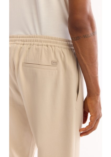 Erkek Bej Beli Lastikli Bağcıklı Duble Paça Jogger Relaxed Fit Pantolon E003000 indirimleri