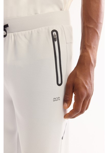 Erkek Açık Gri Beli Lastikli Bağcıklı Bi-Stretch Regular Fit Eşofman Altı A52Y3416 fırsatları