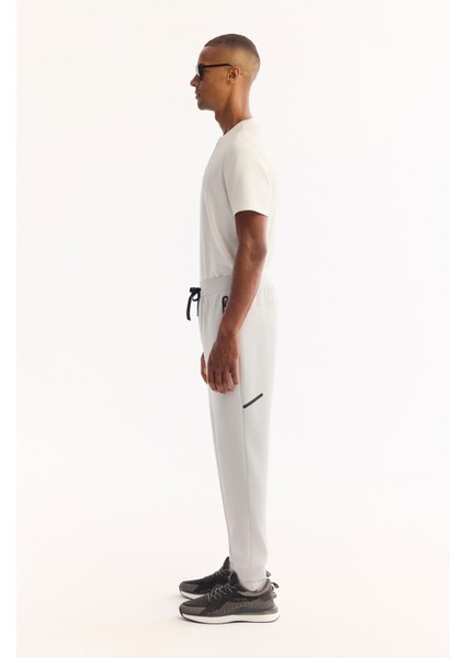 Erkek Açık Gri Beli Lastikli Bağcıklı Bi-Stretch Regular Fit Eşofman Altı A52Y3416 indirimleri