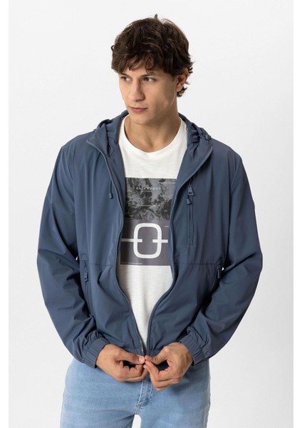 Indigo Regular Fit Kapüşonlu Rüzgar Geçirmez Yağmurluk fiyatları