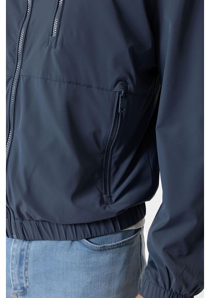 Indigo Regular Fit Kapüşonlu Rüzgar Geçirmez Yağmurluk fırsatları