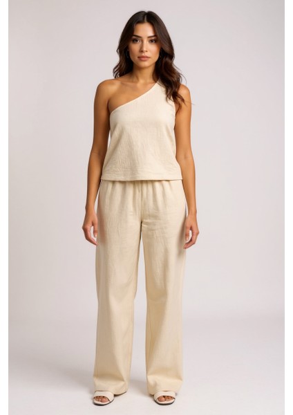 Kadın Beyaz Tek Omuzlu Şık Bluz & Geniş Paça Pantolon Ikili Takım fiyatları