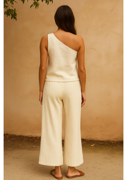 Kadın Beyaz Tek Omuzlu Şık Bluz & Geniş Paça Pantolon Ikili Takım fırsatları