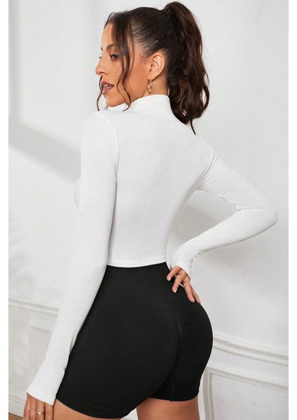 Kadın Beyaz Uzun Kol Fermuarlı Parmak Geçme Detaylı Dik Yaka Crop Top Bluz modelleri