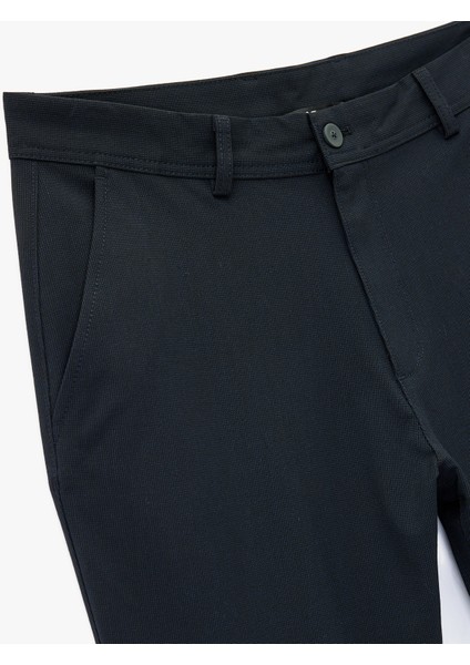 Viskon Karışımlı Cepli Düğmeli Slim Fit Kumaş Pantolon modelleri