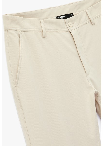 Viskon Karışımlı Cepli Düğmeli Slim Fit Kumaş Pantolon modelleri