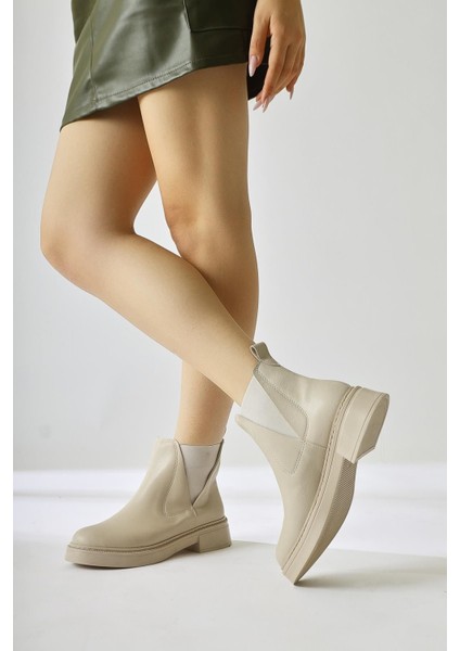 Kadın Yan Lastikli Soğuk Geçirmez Bej Kışlık Bot modelleri