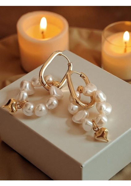 Inci ve Kalp Charmlı Oval Çelik Küpe fiyatları