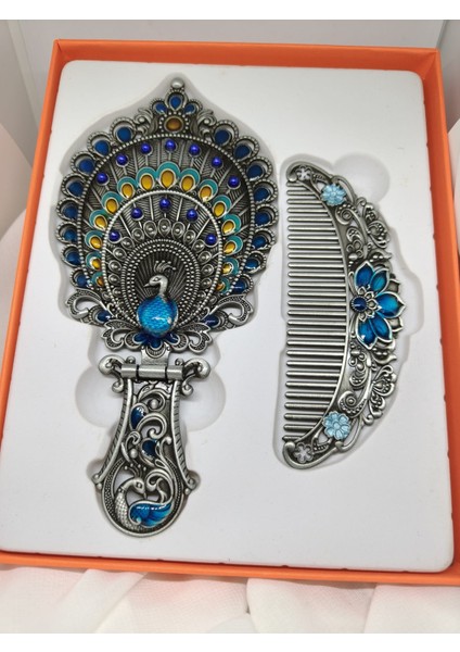 Metal Tavus Kuşu Tüyü Desenli El Aynası ve Tarak Seti (17 x 7.5 Cm) fırsatları