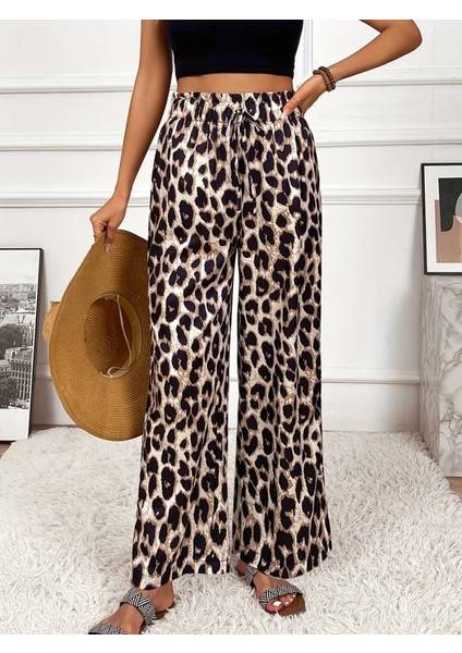 Kadın Yüksek Bel Beli Lastikli Bağcıklı Leopar Desenli Süprem Pantolon modelleri