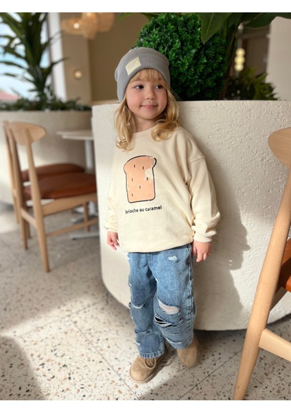 Kız Çocuk Pamuklu Krem Baskılı Sweatshirt ve Yırtık Detaylı Denim Pantolon Takım modelleri