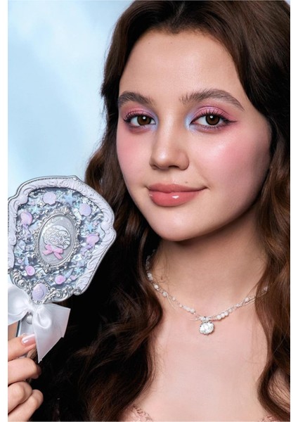 Shell’s Inci Beyazı Vintage Mücevher El Aynası fiyatları