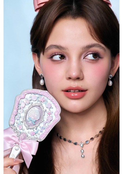 Shell’s Pembe Deniz Kabuğu Vintage Mücevher El Aynası fiyatları