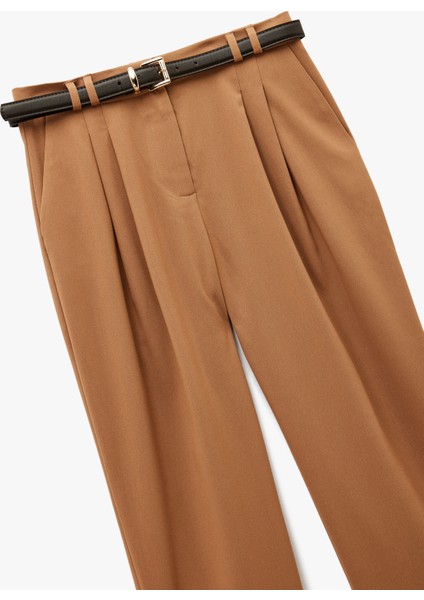 Cepli Pile Detaylı Kemerli Havuç Pantolon modelleri