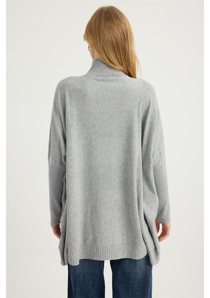 Dik Yaka Geniş Kesim Triko indirimleri