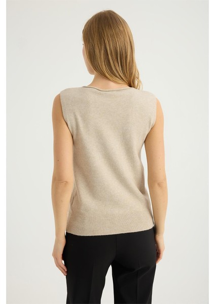 Kolsuz Kıvrık Yaka Triko indirimleri