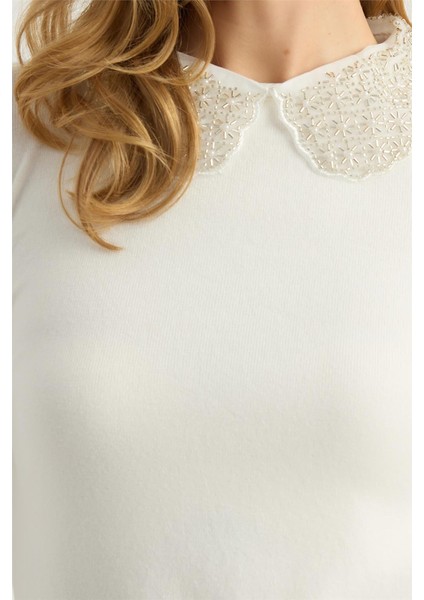 Boncuklu Yakalık Triko fırsatları