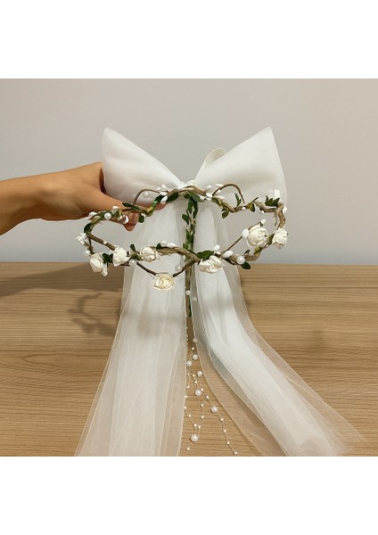 Beyaz Gül Çiçekli Inci ve Fiyonk Detaylı El Yapımı Taç fiyatları