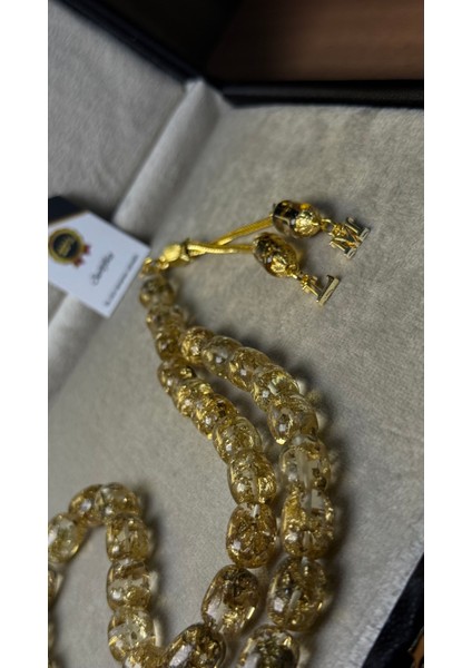 Kişiye Özel Kutu Yazılı,püsküllü Sertifikalı Altın Parçacıklı Tesbih fiyatları