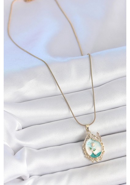316L Çelik Gold Renk Zincir Mi Mineli Çiçek Işlemeli Zirkon Taş Detaylı Portre Model Kadın Kolye fiyatları