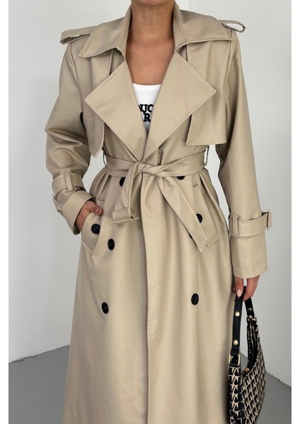 Kadın Trençkot Uzun Suni Deri Kemerli Düğmeli Cepli Yırtmaçlı Kruvaze Yaka Trençkot indirimleri