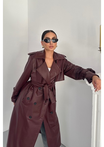 Kadın Trençkot Uzun Suni Deri Kemerli Düğmeli Cepli Yırtmaçlı Kruvaze Yaka Trençkot indirimleri