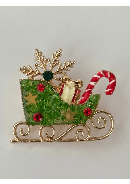 Yeşil Renkli ve Parlak Taşlı Yılbaşı Kızak Figürlü Gold Broş
