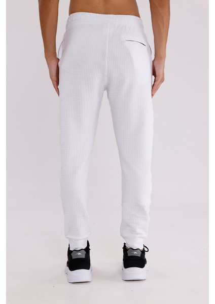 Petek Desenli Elastik Bel Yan Cepli Daralan Paça Spor Eşofman Altı modelleri