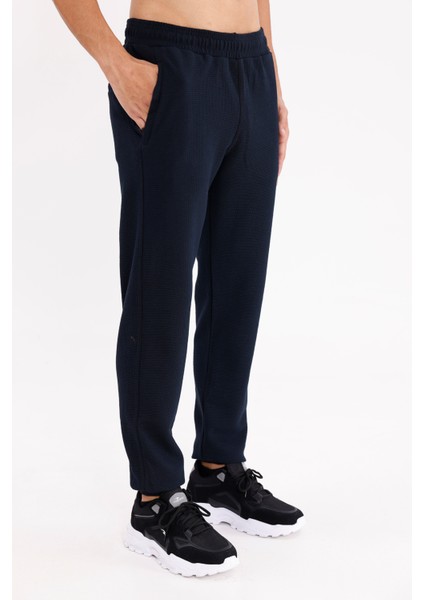 Pıtırcık Yüzeyli Elastik Belli Rahat Kesim Yan Cepli Düz Paça Spor Eşofman Altı fırsatları