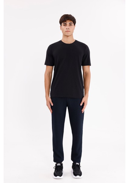 Pıtırcık Yüzeyli Elastik Belli Rahat Kesim Yan Cepli Düz Paça Spor Eşofman Altı indirimleri