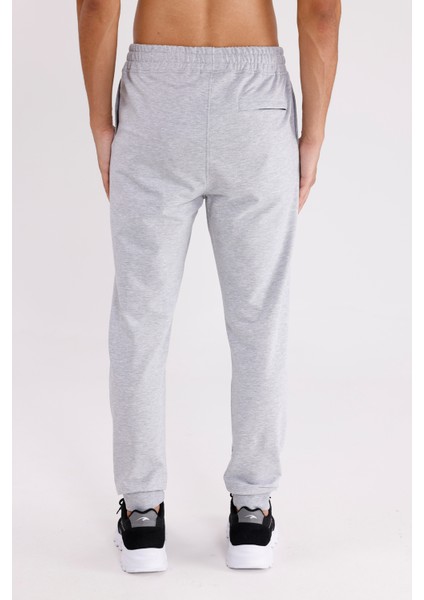 Esnek Bel Lastikli Yan Cepli Arka Cepli Daralan Paça Minimal Logo Detaylı Konforlu Spor Eşofman Altı modelleri