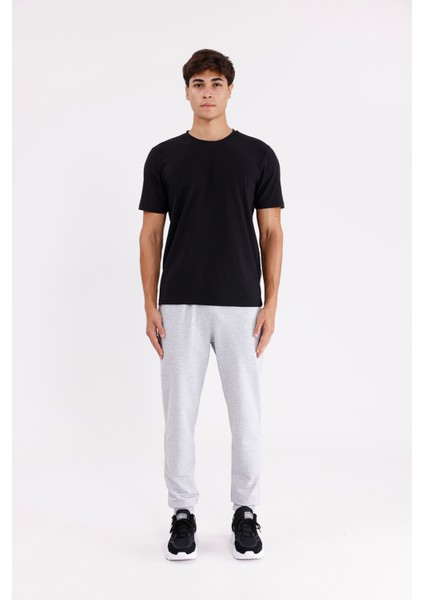 Esnek Bel Lastikli Yan Cepli Arka Cepli Daralan Paça Minimal Logo Detaylı Konforlu Spor Eşofman Altı indirimleri