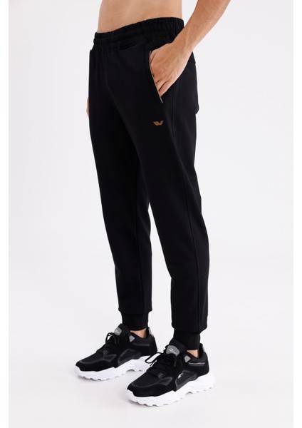 Esnek Bel Bilek Lastikli Kontrast Biyeli Yan Cepli Tek Arka Cepli Daralan Paça Mevsimlik Örme Kumaş Eşofman Altı fiyatları