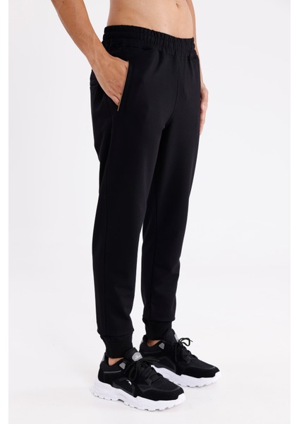 Esnek Bel Bilek Lastikli Kontrast Biyeli Yan Cepli Tek Arka Cepli Daralan Paça Mevsimlik Örme Kumaş Eşofman Altı fırsatları