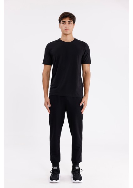 Esnek Bel Bilek Lastikli Kontrast Biyeli Yan Cepli Tek Arka Cepli Daralan Paça Mevsimlik Örme Kumaş Eşofman Altı indirimleri