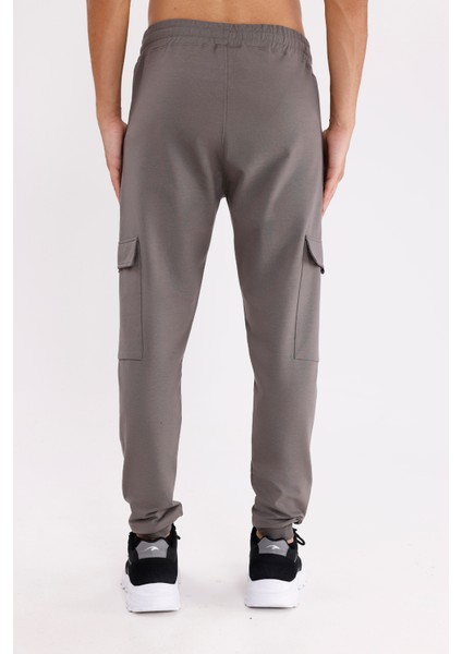 Yan Kargo Cepli Lastik Bel Rahat Kesim Diz Panel Detaylı Daralan Paça Eşofman Altı modelleri