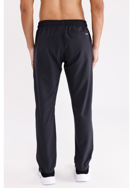 Yan Fermuarlı Cep Diz Dikiş Detaylı Düz Paça Esnek Bel Spor Görünümlü Eşofman Altı modelleri