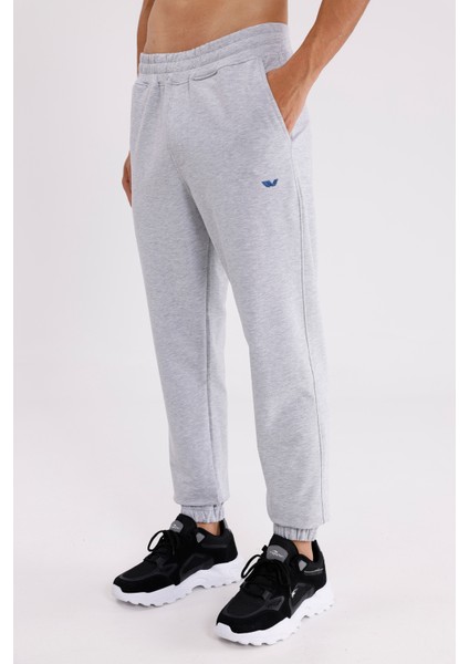 Yumuşak Dokulu Esnek Bel Lastikli Yan Cepli Rahat Kesim Paça Lastikli Mevsimlik Örme Eşofman Altı fiyatları