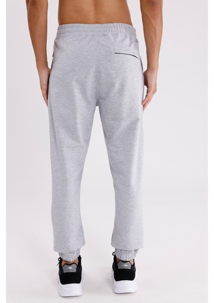 Yumuşak Dokulu Esnek Bel Lastikli Yan Cepli Rahat Kesim Paça Lastikli Mevsimlik Örme Eşofman Altı modelleri