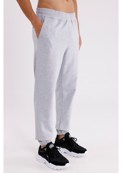 Yumuşak Dokulu Esnek Bel Lastikli Yan Cepli Rahat Kesim Paça Lastikli Mevsimlik Örme Eşofman Altı fırsatları