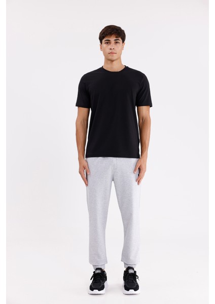 Yumuşak Dokulu Esnek Bel Lastikli Yan Cepli Rahat Kesim Paça Lastikli Mevsimlik Örme Eşofman Altı indirimleri