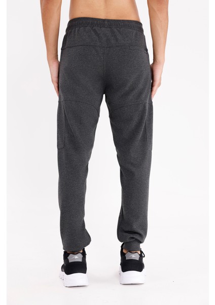 Pıtırcık Yüzeyli Konforlu Bel Lastikli Ayarlanabilir Bağcıklı Iki Cepli Rahat Kesim Eşofman Altı modelleri