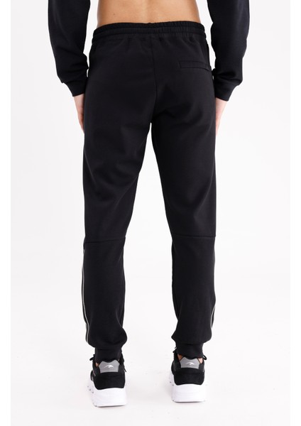 Modal Karışımlı Rahat Kalıp Kordonlu Elastik Bel Yan Cepli Reflektif Şerit Detaylı Ribana Paça Eşofman Altı modelleri