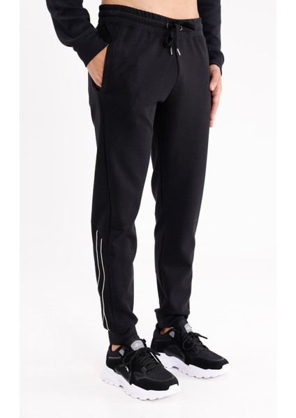 Modal Karışımlı Rahat Kalıp Kordonlu Elastik Bel Yan Cepli Reflektif Şerit Detaylı Ribana Paça Eşofman Altı fırsatları