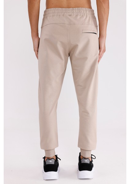 Ottoman Şeritli Fermuarlı Cepli Lastik Belli Daralan Paça Ribanalı Konforlu Spor Eşofman Altı modelleri